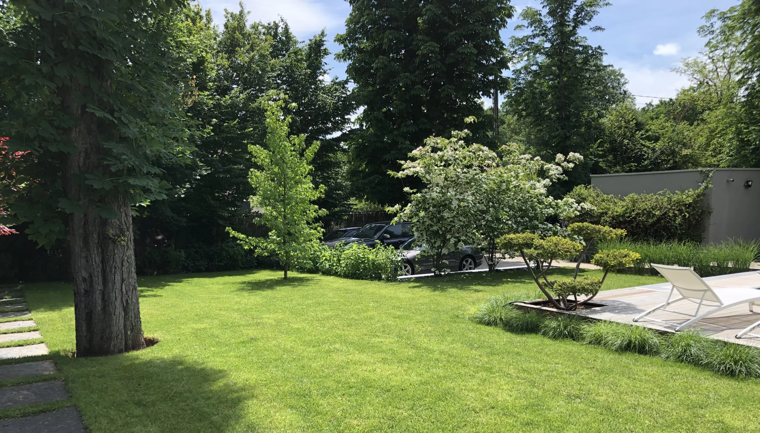 Paysagiste Paris et dans l&rsquo;ouest parisien – Entretien de jardins et terrasses: l’accompagnement expert de Terrasses des Oliviers – Entretien & Maintenance